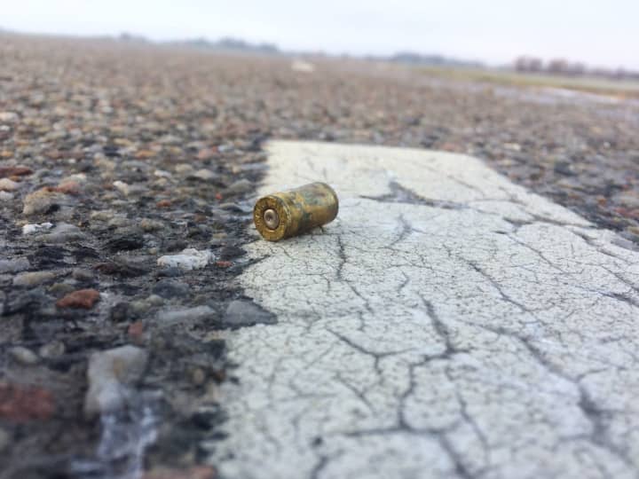 Shell casing on ground