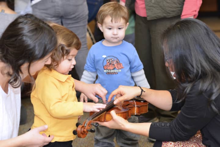 Chi Chi Bestmann, right, will perform another Petite Concerte for children at the Scarsdale Public Library. 