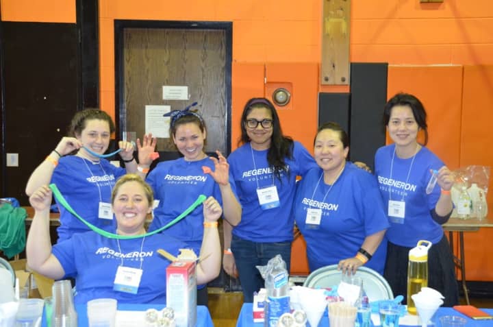 Regeneron researchers volunteered for the day at the recent STEM-tastics festival in Mamaroneck, leading students through various discovery experiences in chemistry.