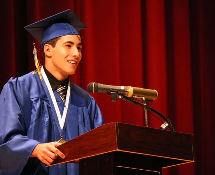 Valedictorian Clifford Soloway delivers his speech at the commencement exercises for Walter S. Panas High School.