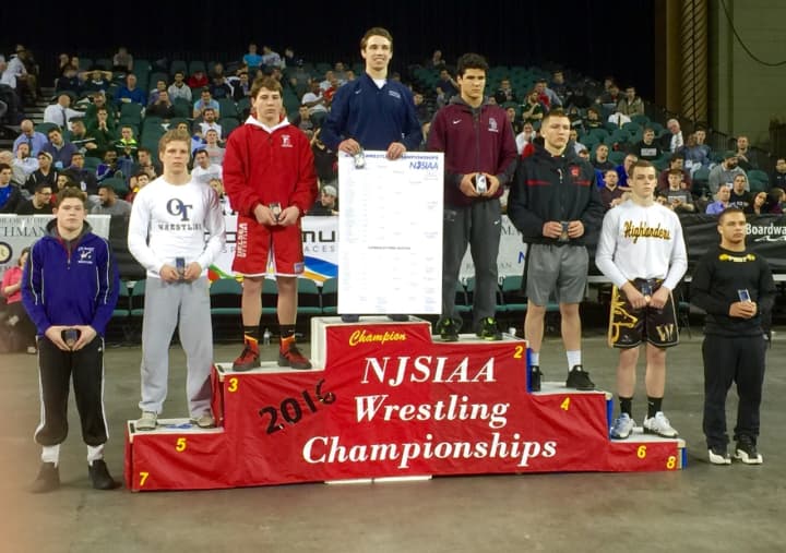 Paramus&#x27; Kyle Cochran stands atop the podium after winning his first state wrestling title.