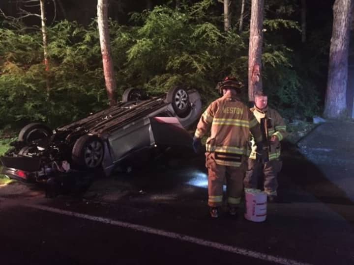 Three people were injured in this one-car rollover crash in Weston.