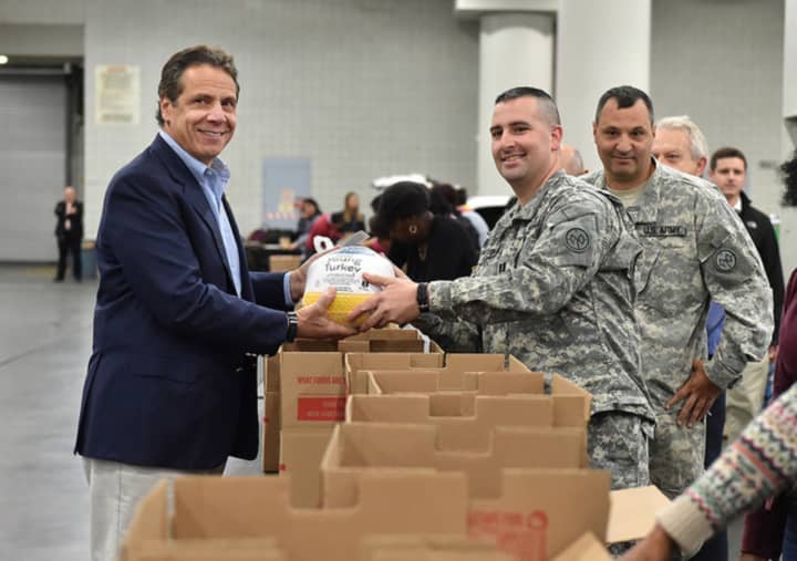 Local soldiers joined New York Gov. Cuomo in a statewide initiative with area corporations to deliver turkey meals to over 35,000 people.