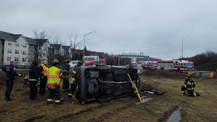 First responders on the scene of a rollover crash on Route 7 in Danbury Saturday.