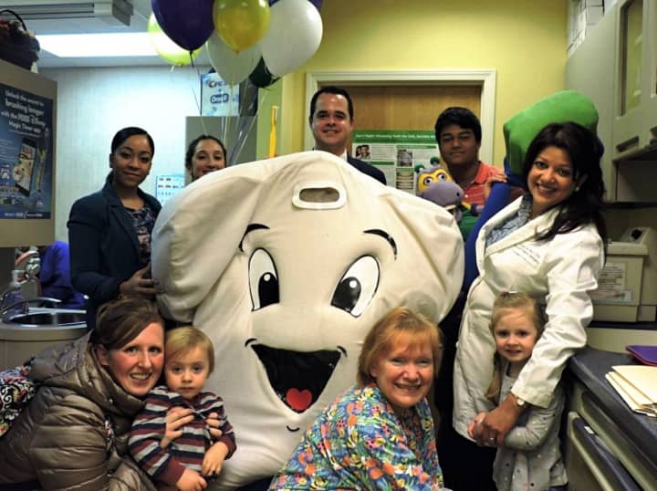 A local dentist and state senator promoted National Children&#x27;s Dental Health Month.