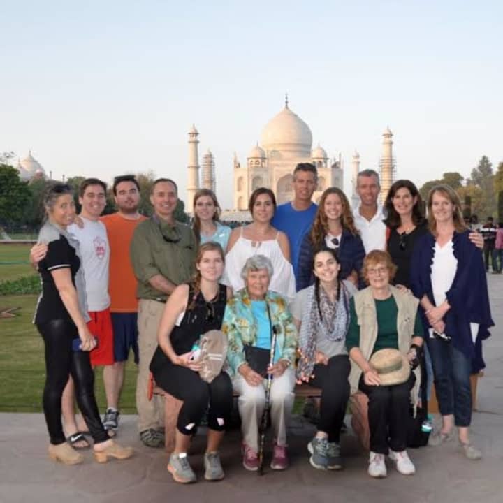 Julia B. Fee real estate agent Fiona Dogan (standing, right) traveled to India with family for an extended winter vacation. Dogan, a native of Scotland, has traveled the world.