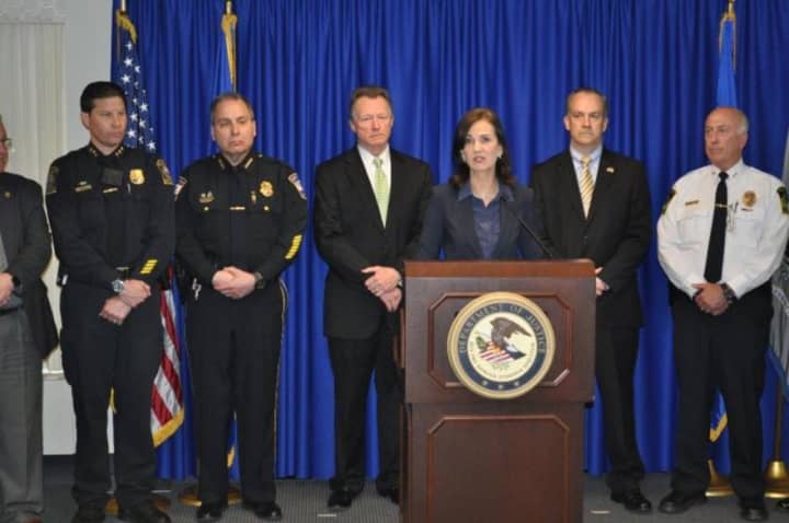Deirdre Daly, U.S. attorney for Connecticut, is joined by members of police departments from across the state to discuss efforts to target heroin dealers after a rise in overdose deaths.