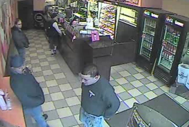 Westport police released this photo, taken by a security camera, which they say shows two men suspected in the theft of a cellphone at the Dunkin&#x27; Donuts located at 1595 Post Road E.