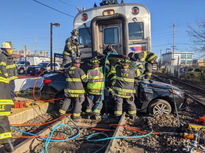 Hackensack firefighters free driver.