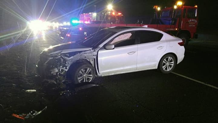 A car hit a guardrail on Route 8 Thursday evening in Shelton.