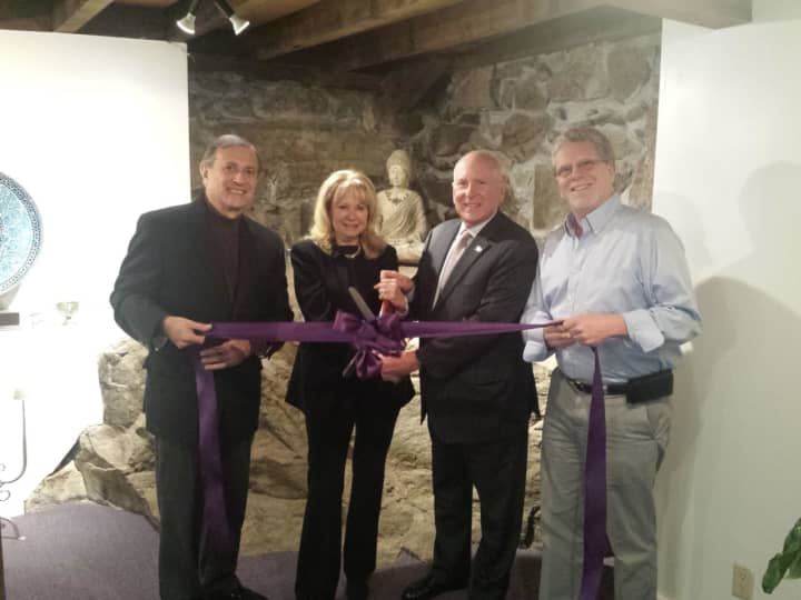First Selectman Jim Marpe participates in a Dec. 5 ribbon-cutting ceremony to officially open Me, Myself &amp; I, a wellness center for women in Westport.