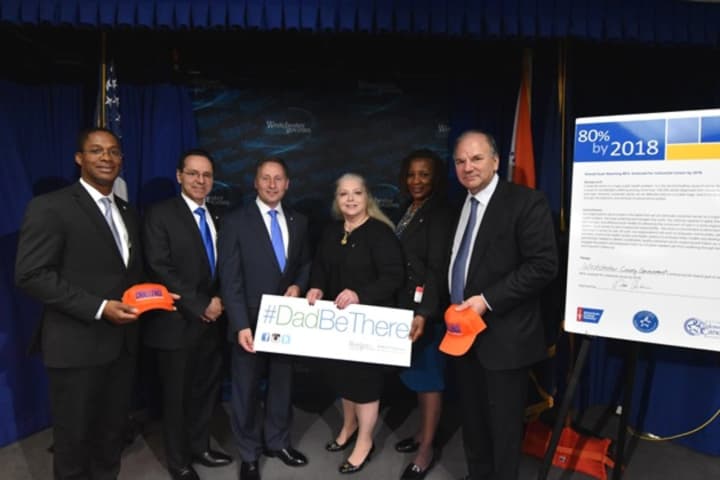 County Executive Robert Astorino, center, hosted a #DadBeThere Father’s Day call for men to take control of their health, signing a pledge with the American Cancer Society uniting in a shared goal of reaching 80 percent of adults be screened.