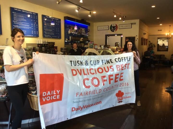 Tusk &amp; Cup in Ridgefield proudly displays its DVLicious banner for wining best coffee in Fairfield County.