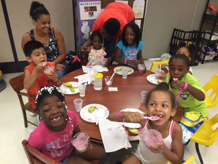 Kids, at a child care center, take part in the Eat Well Play Hard in Child Care Settings (EWPHCCS) project that fights obesity, among Child Care Resources of Rockland initiatives.