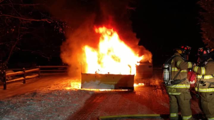 <p>The Weston Volunteer Fire Department responds to a pickup truck fire on Monday evening.</p>