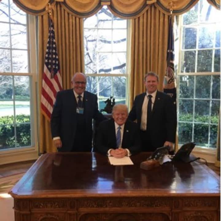 Andrew Giuliani (right) with President Donald Trump and former New York City Mayor (and father) Rudy Giuliani in the Oval Office.
