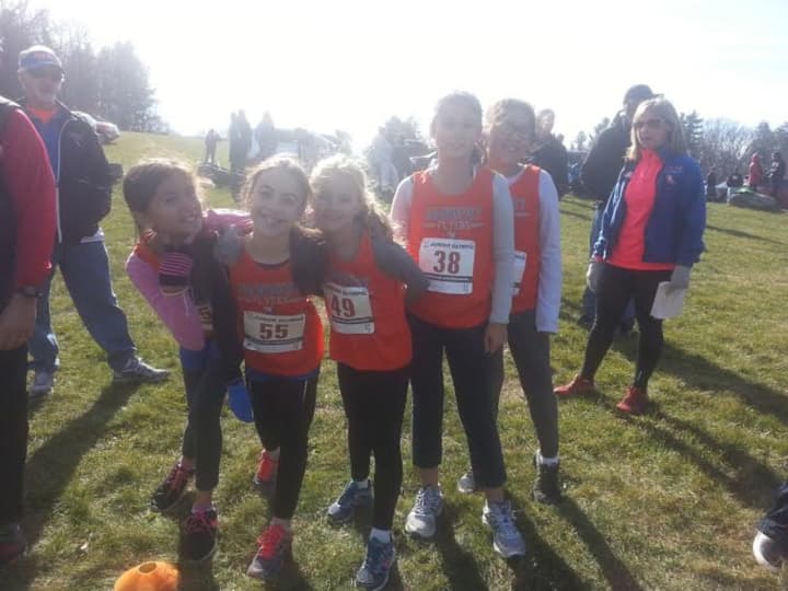 Girls on the Danbury Flyers ran Sunday at the district championship meet in Litchfield. 