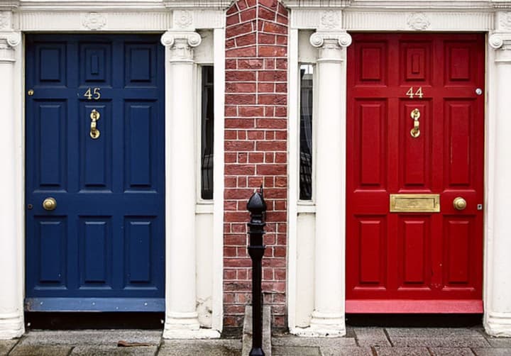 Navy and red remain classic choices for front door colors. Wallauer&#x27;s Design Director Kimberly Scappaticci recommends Benjamin Moore&#x27;s Aura Exterior Paint.