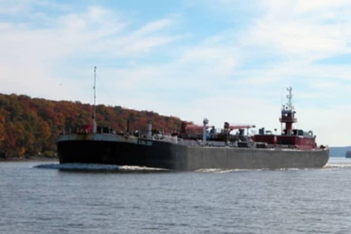 A fuel barge traverses the waters of the Hudson River. Cortlandt is fighting plans to build barge anchorages off Verplanck and Montrose.