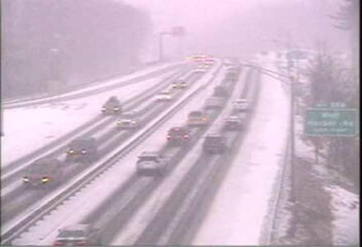 The Merritt Parkway is snowy near Exit 55 in Milford on Monday.