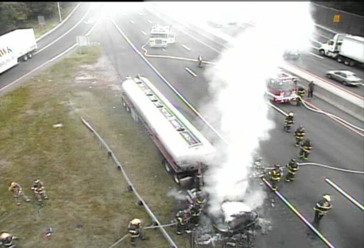 All lanes of I-95 south are closed as firefighters battle a burning tanker.
