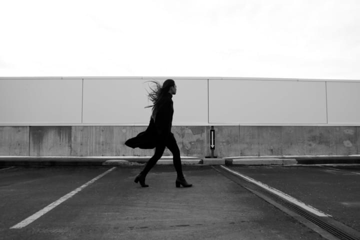 Woman walking on a windy day