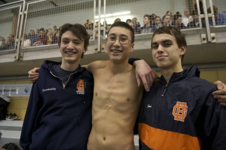 Swimmers from Greeley wait for their events.