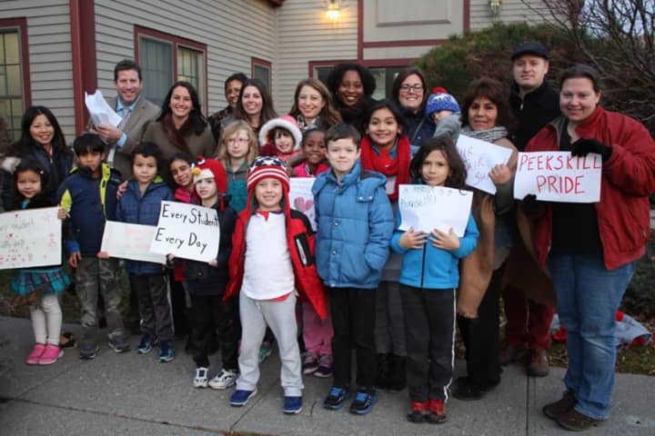 Peekskill students, parents and educators hand-delivered letters to Sen. Terrence Murphy&#x27;s Shrub Oak office asking that the state unfreeze aid and revamp the current formula for its distribution.