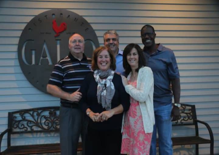 Former Boys &amp; Girls Club Director Terry Hughes, and Ridgefield A Better Chance (RABC) Board members Kelby Edwards, Sue Ferguson and Jeanne Manto (pictured with owner Raffaele Gallo) will take turns behind the bar Thursday at Gallo Ristorante.