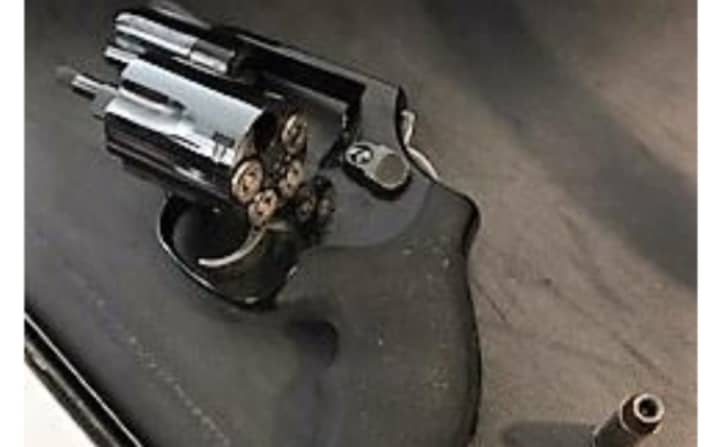 Gun, bullets found in Newark Airport carry-on bag.