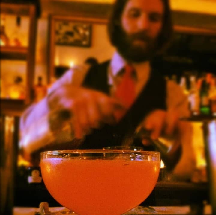 General Manager Clark Moore pouring a cocktail at Harper&#x27;s in Dobbs Ferry.