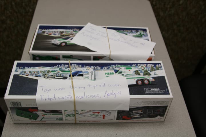 Hess truck boxes with handwritten apology notes found at the Wayne Police Department. 