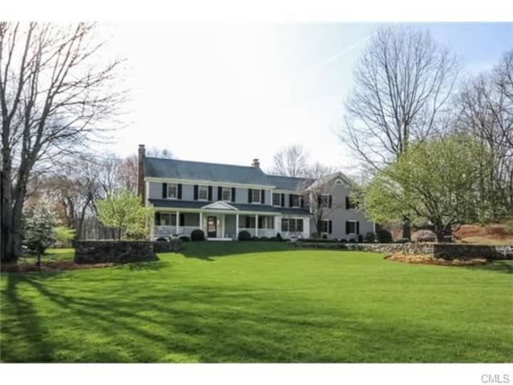 The Southport home at 255 Half Mile Road offers nearly two acres of level ground.