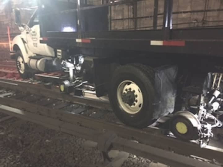A contractor&#x27;s high rail vehicle — a maintenance vehicle that can operate both on railroad tracks and a conventional road — became disabled in the vicinity of Melrose on Monday morning, causing long delays on Metro-North.