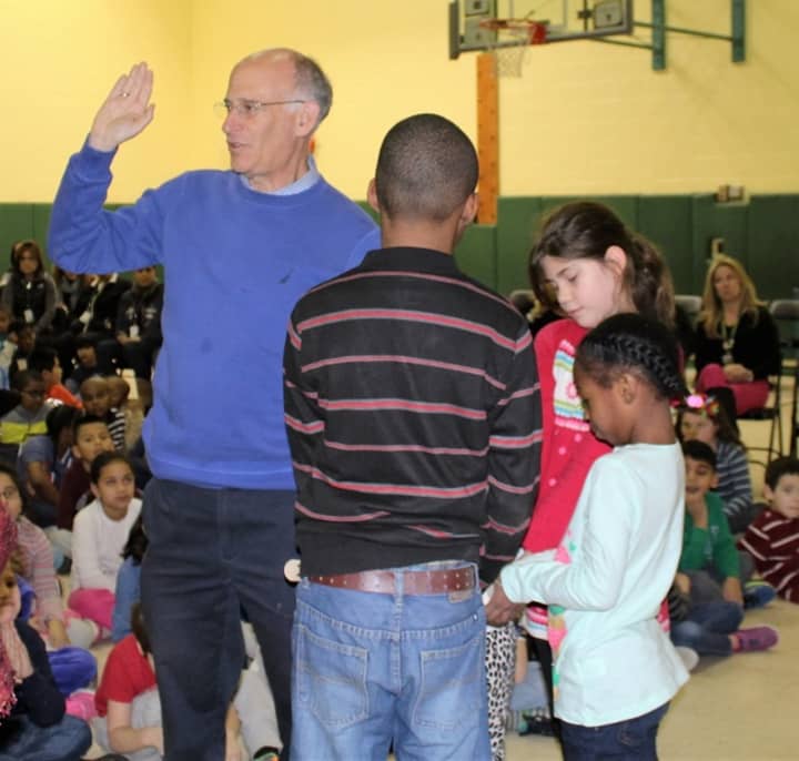 Town Supervisor Paul Feiner is sworn in by Highview Elementary School students.
