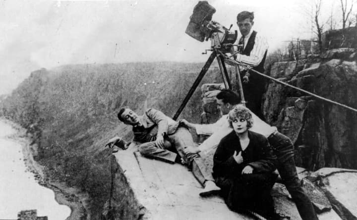 Pearl White during filming &quot;The House of Hate&quot; at Cliffhanger Point on the Palisades in 1918.