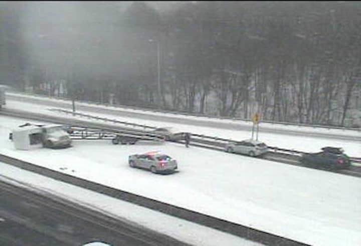A jack-knifed tractor-trailer blocks most of I-95 northbound in Milford near Exit 35.