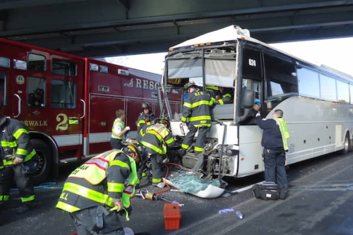 The driver of a bus that collided with a tractor trailer on I-95 southbound in Norwalk Wednesday was taken to the hospital with serious injuries.