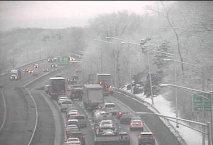Traffic on I-95 south in Westport is slow due to a tractor-trailer fire on a snowy Monday morning.