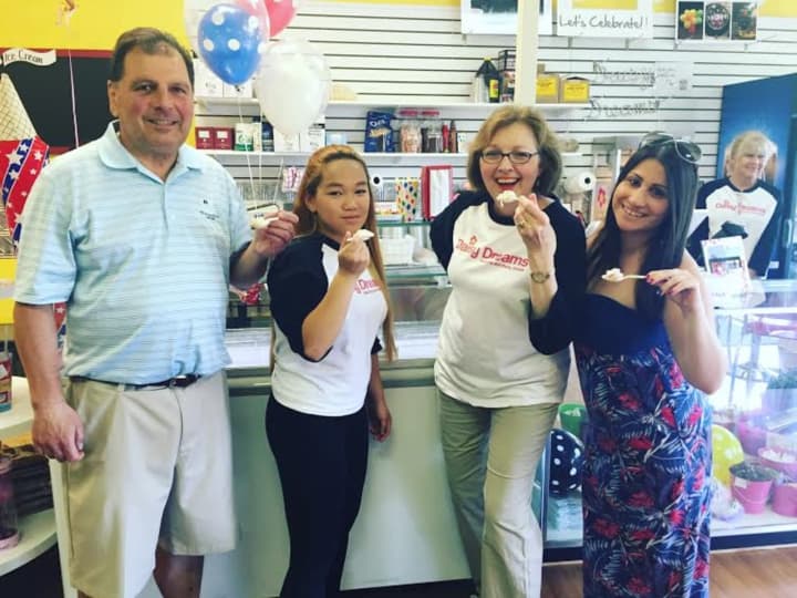 Daisy Dreams co-owner Kathleen Ruane and her daughter Rose (center) are flanked by two members of the Suffern Chamber of Commerce during an ice cream social on Saturday afternoon.