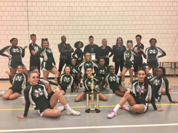 The Norwalk High School Cheerleading team won the coed title at the recent FCIAC Championships, the first cheerleading title for the Bears.