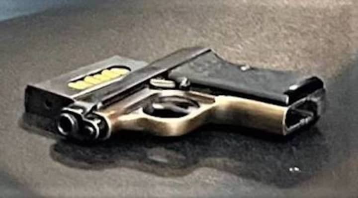 The handgun and bullets were found in a carry-on bag at JFK Airport.