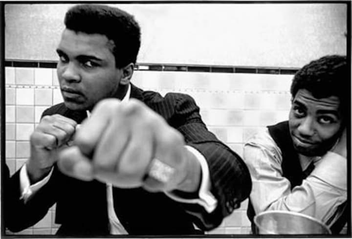 Muhammad Ali in 1969 at Jake’s Diner in Athens, Ohio by Richard Frank