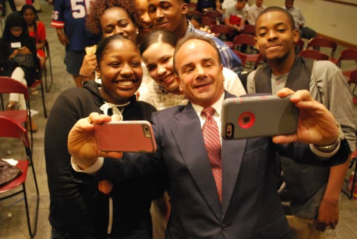 Bridgeport Mayor Joe Ganim, center, launched new programming and job opportunities for city youth Wednesday at City Hall.