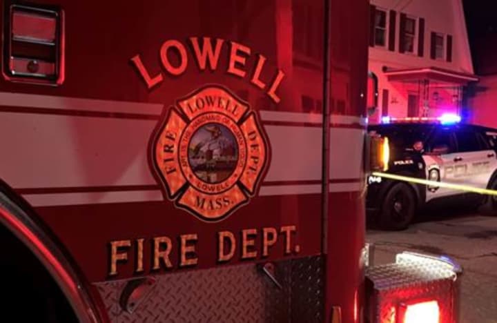 Lowell firefighters battle a blaze at 114 Farmland Road on Saturday night, March 16.&nbsp;