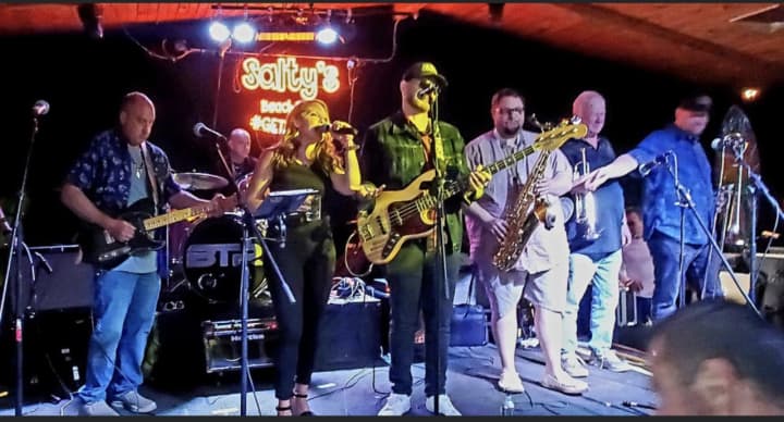 Mike Dalton’s Band, from left to right, Jay Tango on guitar, Ingo Marte on drums, Amy Hariegel, Lawrence Haber on bass, with Jersey Horns&#x27; Greg Grispart on sax, Benny Sesto on trumpet &amp;  Darrell Hendricks, trombone. (Not shown: Eddie Carson, guitar)