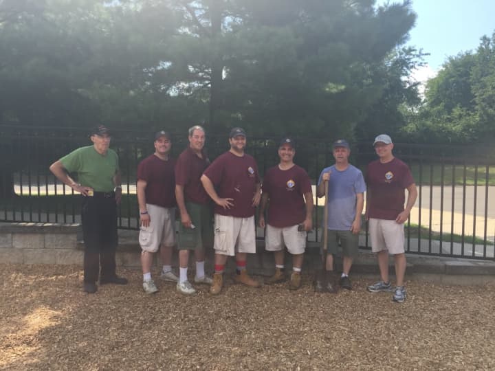Members of Knights of Columbus St. Matthew Council #14360 in Norwalk spent Aug. 20 helping out at All Saints Catholic School.