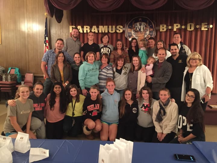 Volunteers gather for a photo after packing goody bags at the Paramus Elks Lodge on Oct. 14.