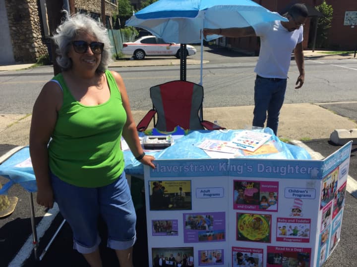 Ulanda White pictured alongside the Haverstraw King&#x27;s Daughter Library stand at the Haverstraw Farmers&#x27; Market.