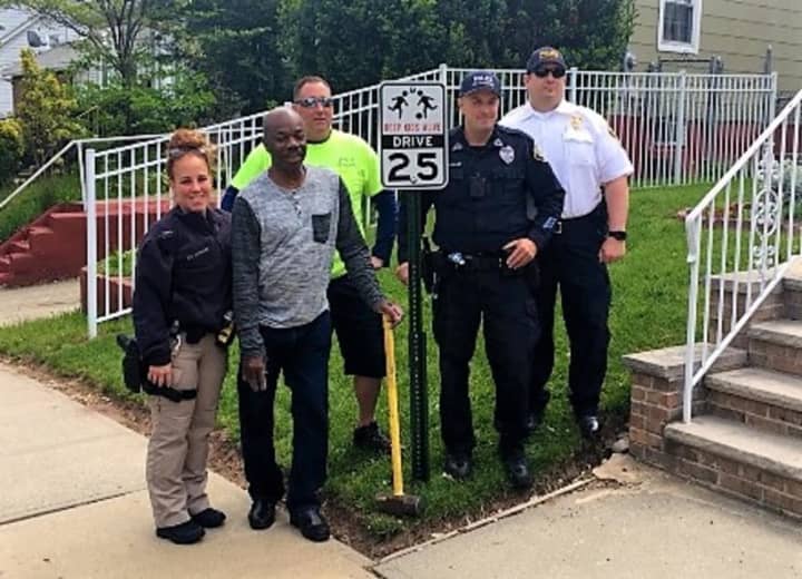 (FROM LEFT:) Garfield Traffic Division Officer Claire Follari, Clyde Bamby, DPW Worker Scott Komstead, Community Affairs Division Officer Jeff Stewart, Capt. Martin Gray.